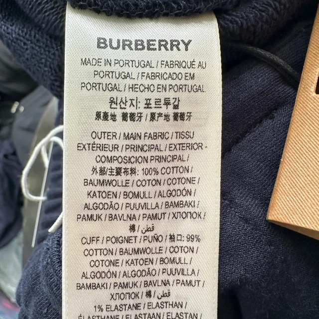 Burberry Equestrian Knight Patch Sweatpants in Black Cotton in black, photo 5 of 6 from ShopSimon