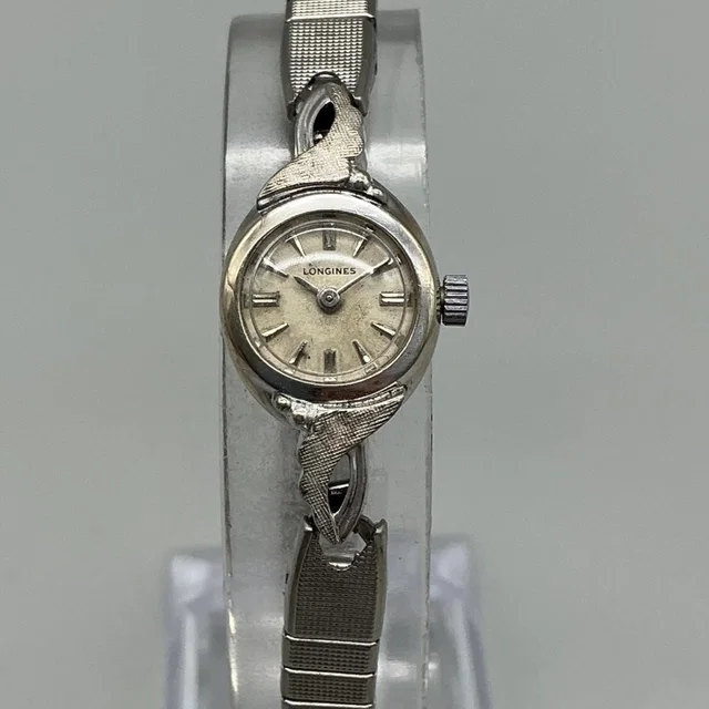 Longines Vintage Swiss Womens Watch 15mm 10k Gold Filled Stretch Manual Wind in gold from Poshmark