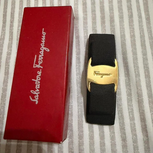 Ferragamo Women's Hair accessory - Gold in gold from Depop, photo 1 of 1