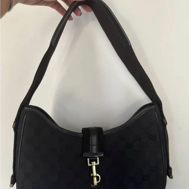 Gucci Black Hobo Shoulder Bag in black|gold from Poshmark, photo 1 of 1