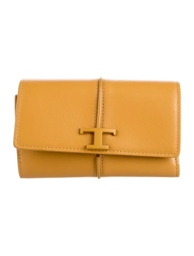 Tod's Leather Continental Wallet in yellow Leather from The RealReal