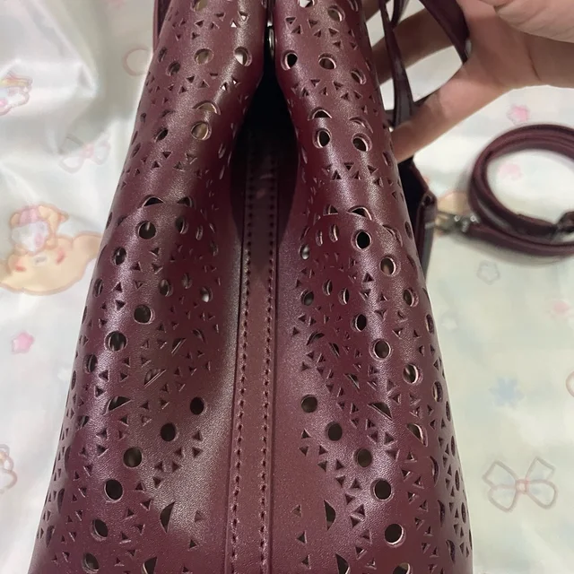Alaïa Alaa Laser-Cut Tote Bag In Wine in red from Poshmark, photo 5 of 15