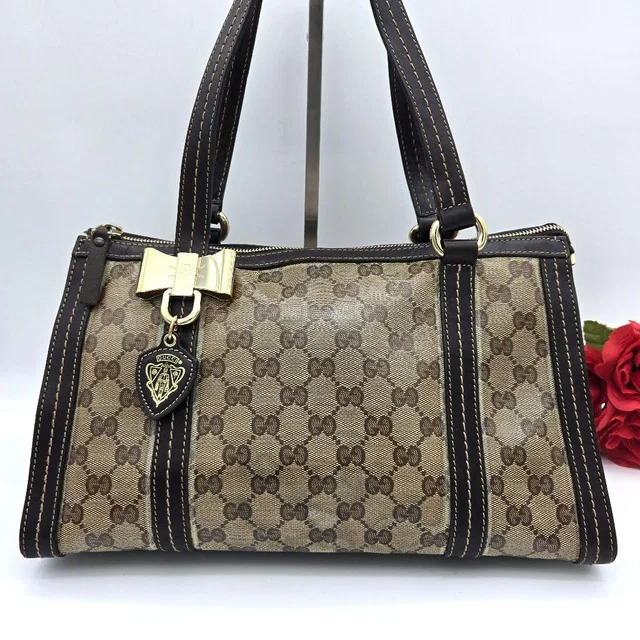 Gucci Handbag Bag GG Crystal Brown in Brown Leather from The Reluxe