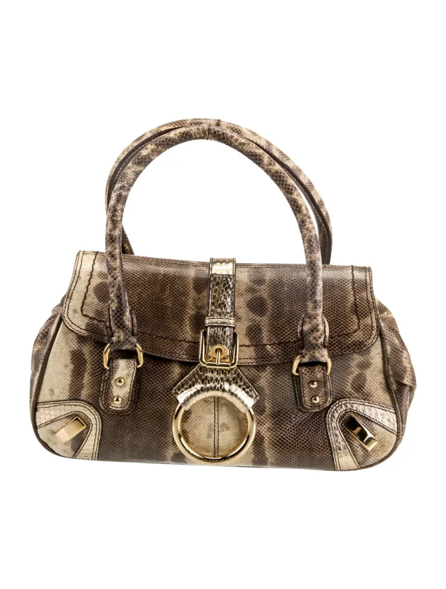 Dolce & Gabbana Top Handle Other bag in Gold Canvas from The RealReal