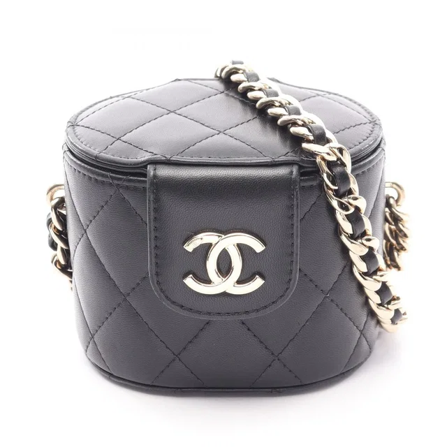 Chanel Shoulder Bag Quilted Mini Vanity Black Lambskin Chain in Black Lambskin from The Reluxe