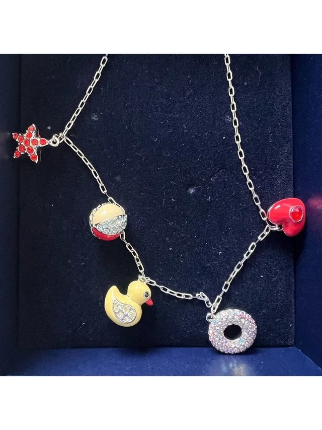 Swarovski Vintage Playful Multicolor Charm Necklace With Beach Rubber Duck Heart in yellow|red from Poshmark