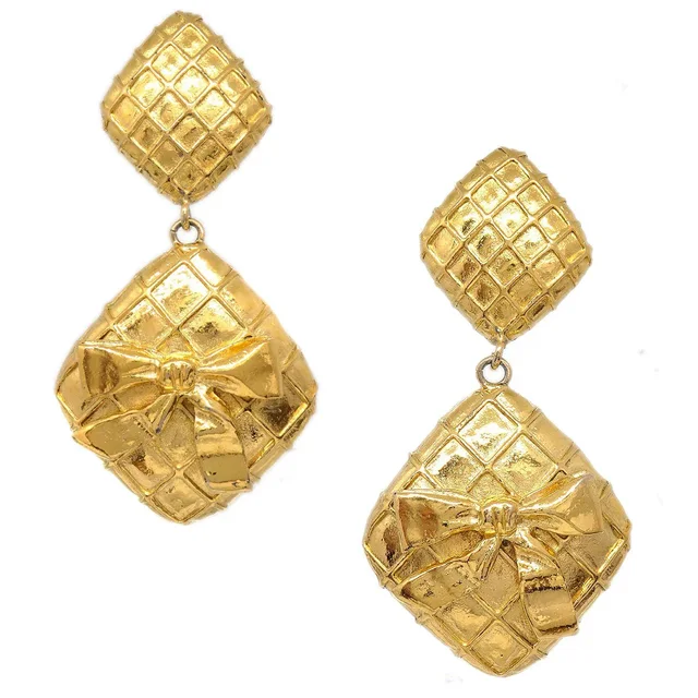 Chanel 1980s Bow Dangling Earrings Clip-On Gold in Gold from AMORE Vintage Tokyo