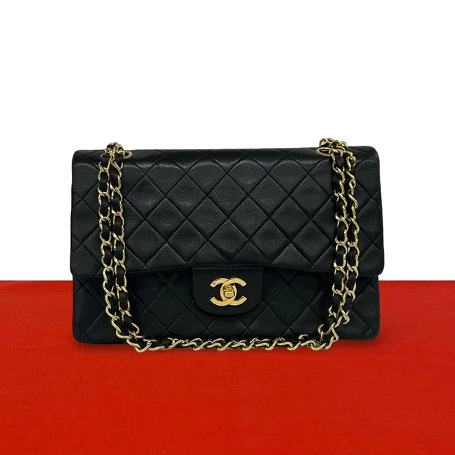 Chanel Vintage Quilted CC Logo Double Flap Lambskin Shoulder Bag Black in Black Lambskin from The Reluxe