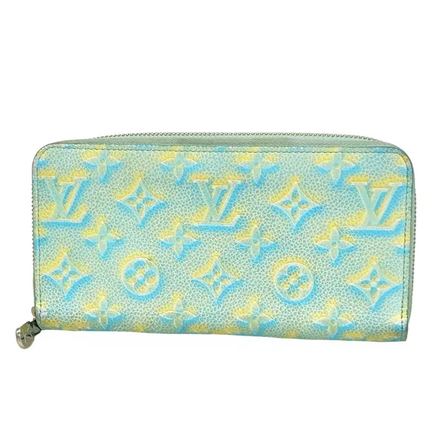 Louis Vuitton Wallet Monogram Empreinte Summer Star Zippy Vert in Green from The Reluxe