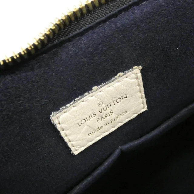Louis Vuitton Tuileries Monogram Tote Bag in Brown Canvas from LuxUness, photo 8 of 8