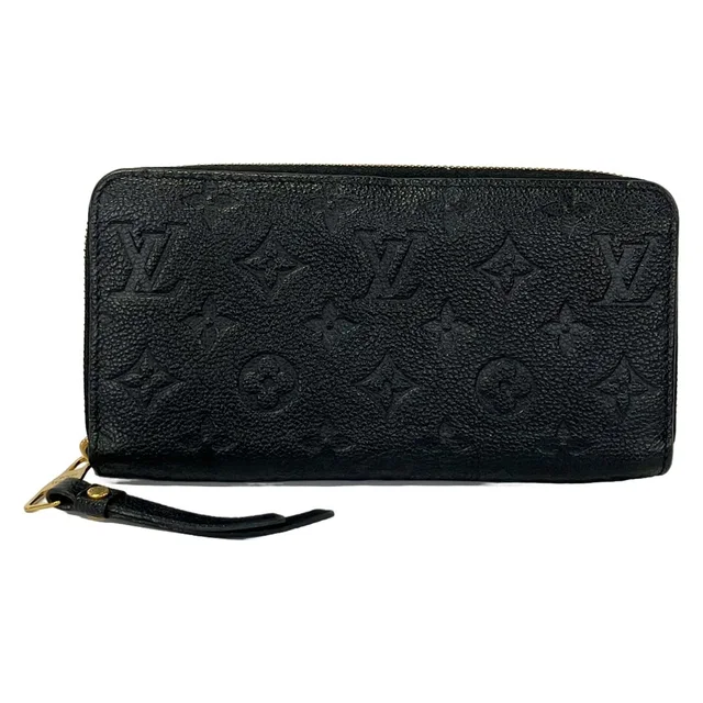 Louis Vuitton Wallet Monogram Empreinte Zippy Noir Leather in Black Leather from The Reluxe