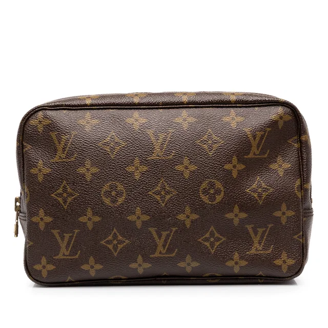 Brown Louis Vuitton Monogram Trousse Toilette 23 Clutch Bag in Brown Coated canvas from Designer Revival