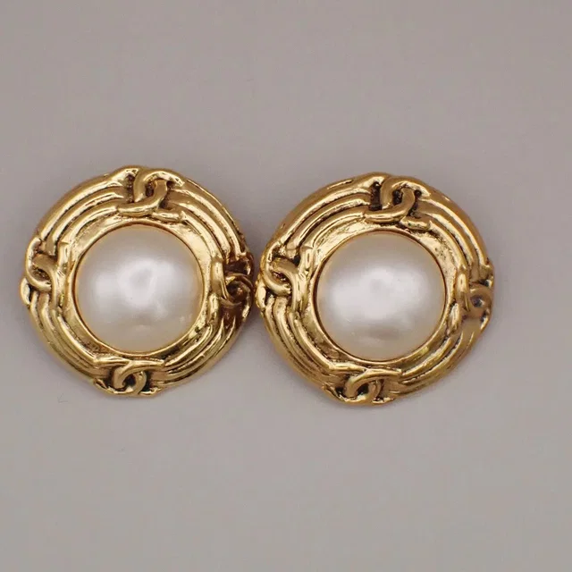 Chanel Vintage Round Clip-On Metal With Faux Pearl Gold _plated Jewelry in Gold from HEWI
