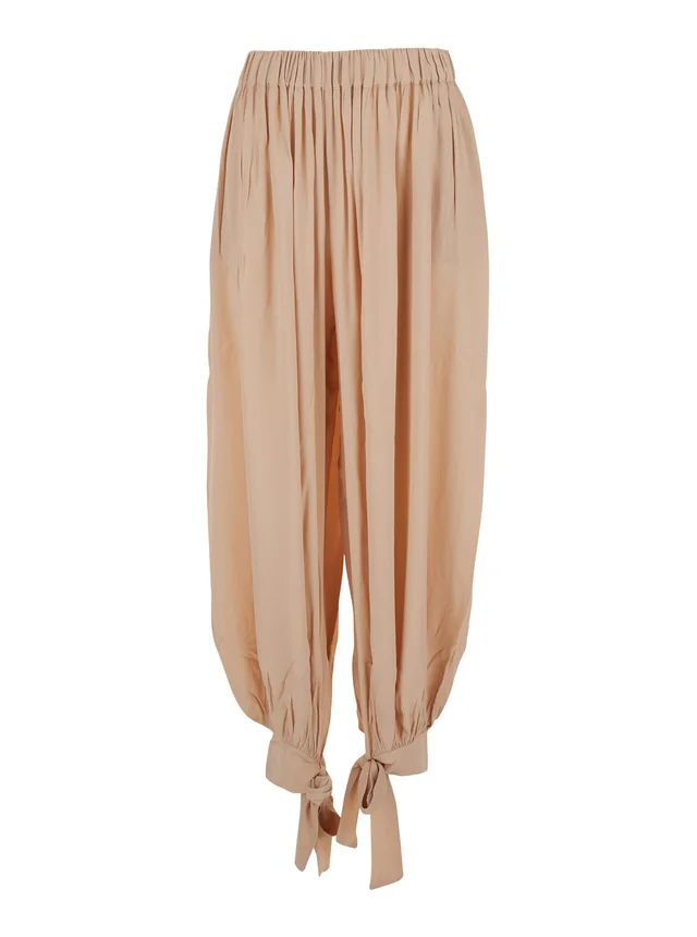 THE ANDAMANE Pink Pants with Elastic Waist and Knots at the Hems in Fabric for Women in Pink, photo 2 of 6 from Gaudenzi Boutique