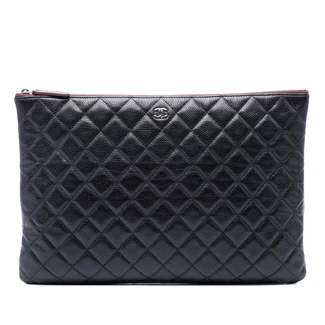 Black Chanel Large Quilted Caviar O Case Clutch in Black Caviar leather from Designer Revival