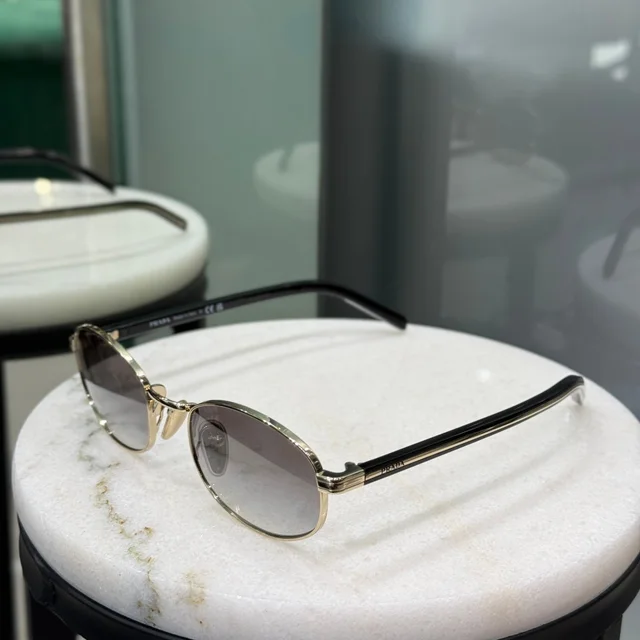 Prada Round Lens Sunglasses in Black from Revivre Luxury Consignment