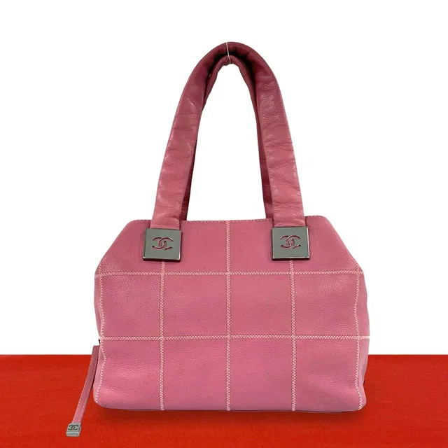 Chanel Choco Bar CC Logo Caviar Leather Mini Boston Bag Pink in Pink Caviar leather from The Reluxe