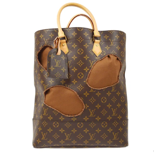 Louis Vuitton x Rei Kawakubo Comme des Garcons 2014 Monogram Bag With Holes M40279 in Coated canvas from AMORE Vintage Tokyo