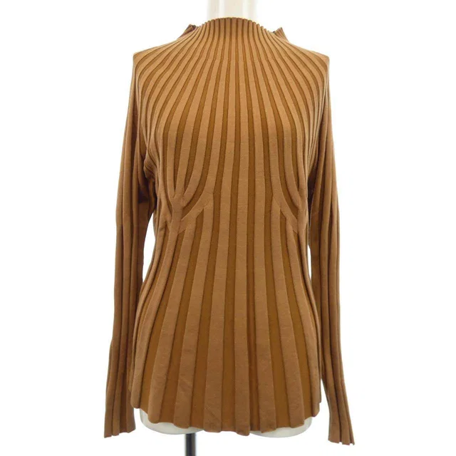 Burberry Tops & shirts from LuxUness