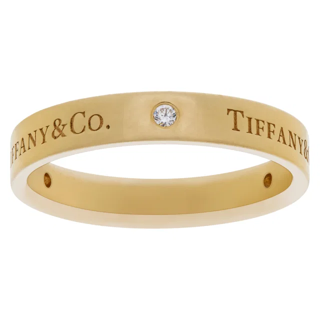 Tiffany & Co. 18k gold band ring with three round brilliant diamonds in Gold Yellow Gold from Gray And Sons