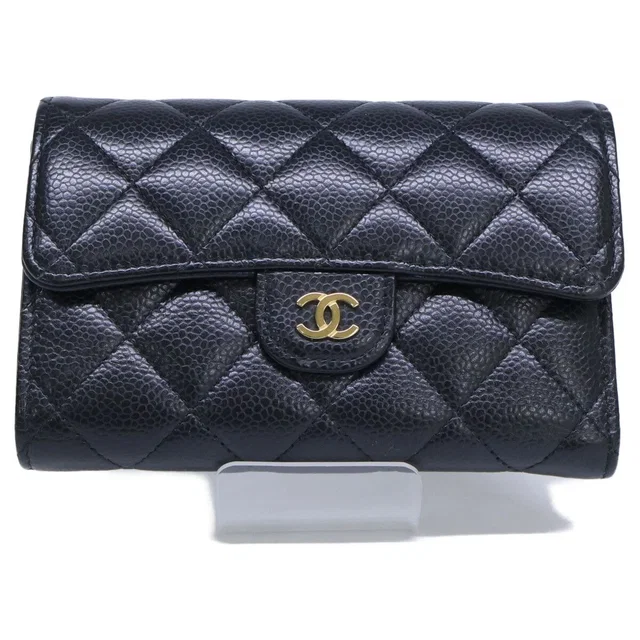 Chanel Caviar Leather Quilted Medium Flap Wallet Trifold in Caviar leather from The Reluxe