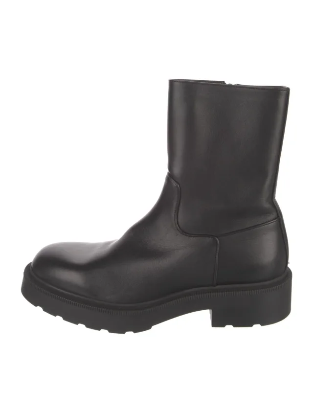The Row Leather Moto Boots in black Leather from The RealReal