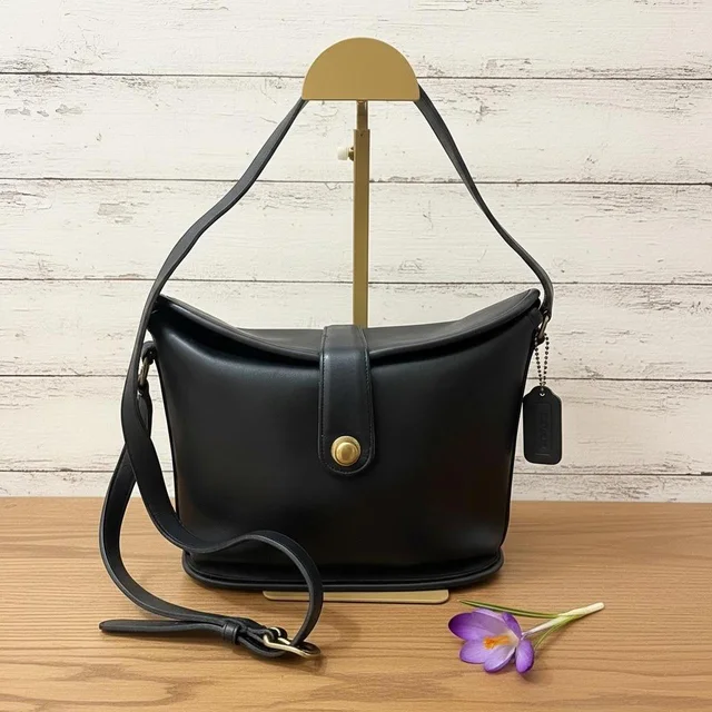 Coach Women's Crossbody bags - Black in black Leather from Depop, photo 1 of 1