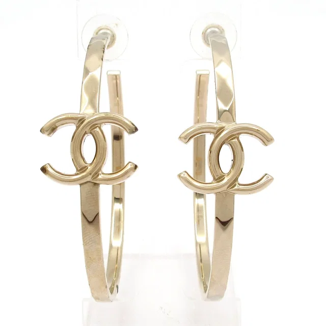 Chanel Earrings Gold Hoop CC Logo in Gold from The Reluxe