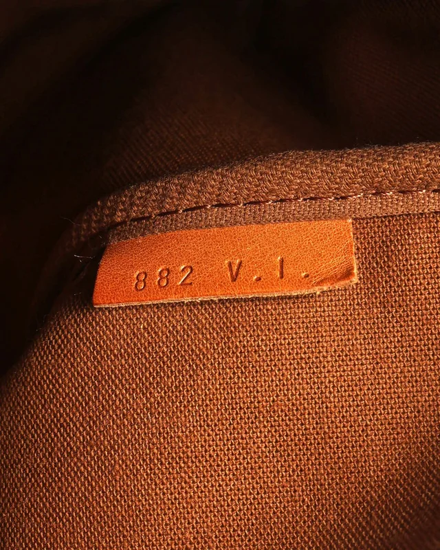Louis Vuitton Monogram Saumur 35 Bag in Coated canvas from A Retro Tale, photo 10 of 11