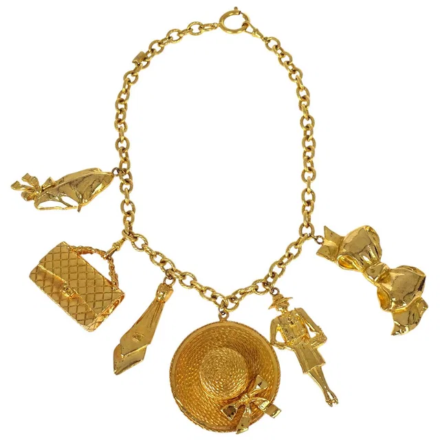 Chanel Gold Icon Charm Necklace in Gold from AMORE Vintage Tokyo