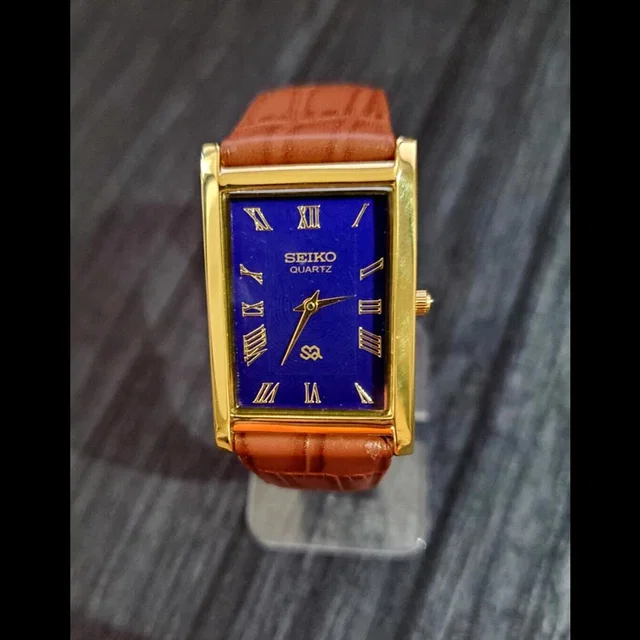 Nos Men's Slim Seiko Gold Tank Rectangular Blue Dial New Mvt & Batt in gold|blue from Poshmark