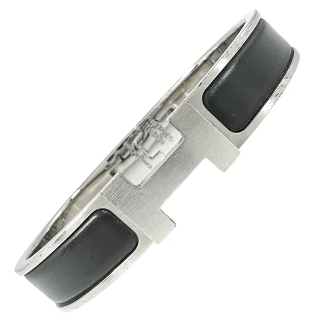Hermès Clic H Silver Black Bangle Bracelet in Black from The Reluxe