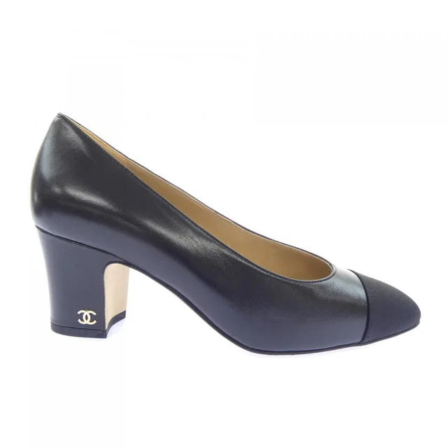 Chanel Pumps Heel Black in Black Goatskin from The Reluxe