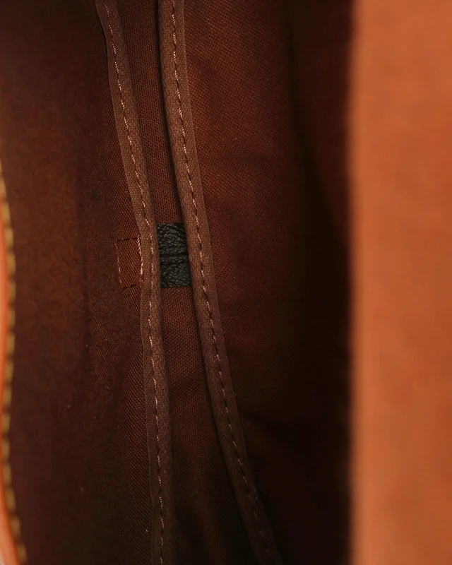 Louis Vuitton Monogram Saumur 30 Bag in Coated canvas from A Retro Tale, photo 9 of 9
