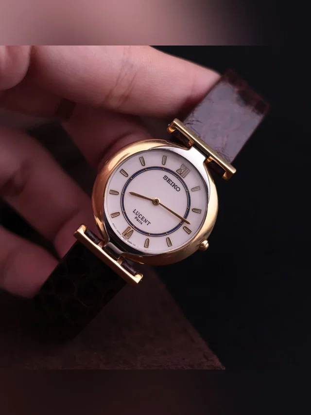 Vintage 1994 Seiko Lucent “Paris” 7n00-618a Women’s Watch in gold|white Leather from Poshmark