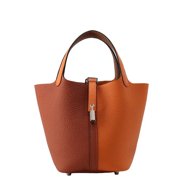 Hermès Picotin Lock Casaque2 Orange/Cuivre/Gold Taurillon Clemence Size PM in Orange Clemence leather from GALLERY RARE