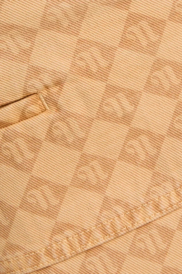 Nanushka Asymmetric Logo-Print Organic Cotton Denim Wrap Skirt in Sand, photo 4 of 4 from THE OUTNET