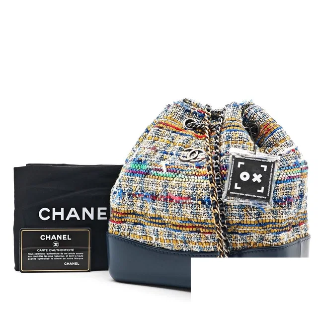 Chanel Gabrielle Fringe Tweed Backpack in Tweed from The Reluxe