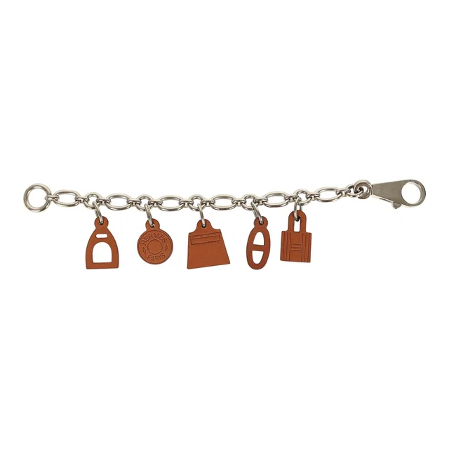 Hermès Olga Bag Charm Fauve Barenia Palladium Hardware in Leather from Madison Avenue Couture
