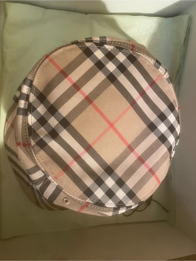 Burberry Tan Plaid Bucket Hat With Black And Red Accents in black|brown|neutral from Poshmark