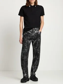 Versace Straight Jeans with Floral Print in 100% Cotton, 0% Calf, photo 2 of 8 from LUISAVIAROMA
