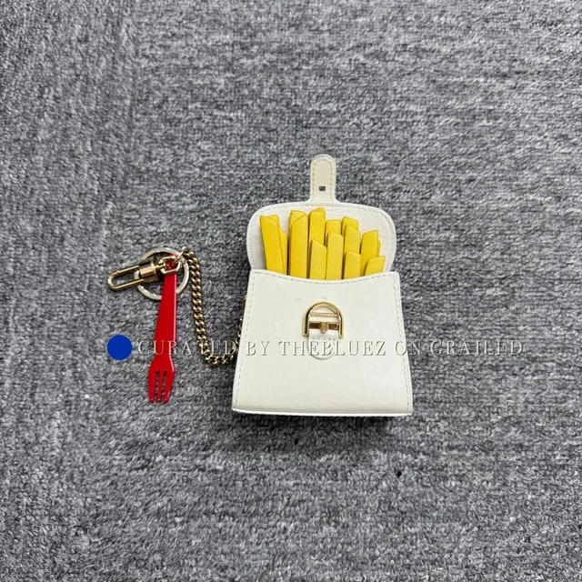 Delvaux Fries Bag Charm in white from Grailed