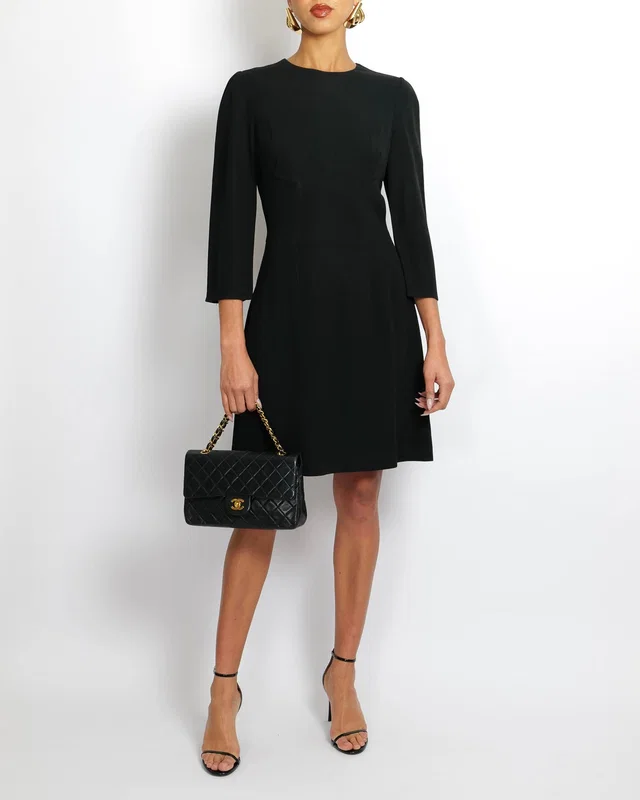 Dolce & Gabbana Black Long-Sleeved Mini Dress Size IT 44 (UK 12) in Black from Sellier