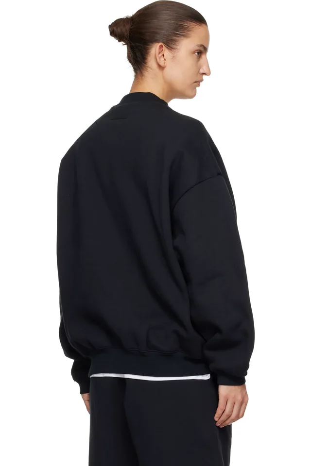 Fear of God ESSENTIALS Black Varsity Crewneck Sweatshirt, photo 3 of 4 from SSENSE