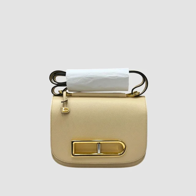 Delvaux Ringo Shoulder Bag Beige in Brown in brown|red Calfskin from Grailed, photo 1 of 1