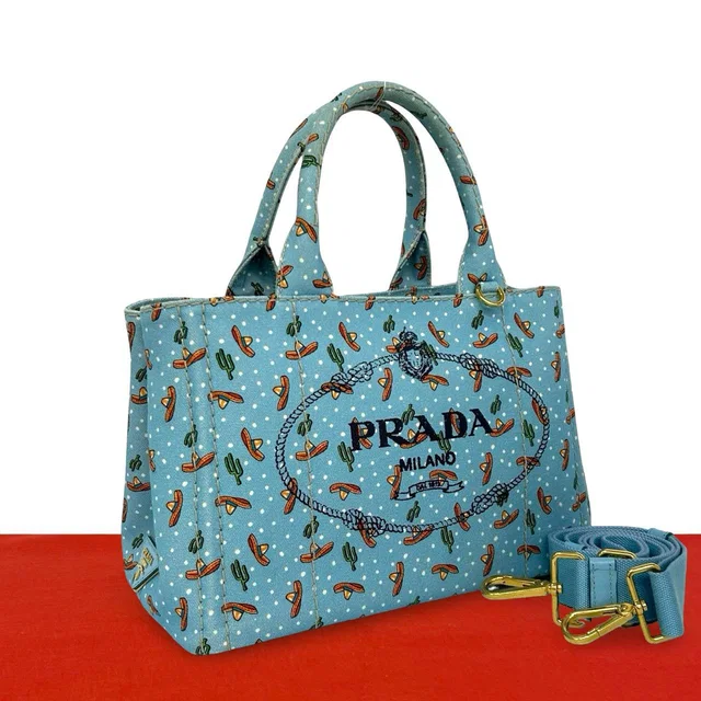 Prada Canapa Canvas 2-Way Shoulder Bag Mini Tote Blue in Blue Canvas from The Reluxe