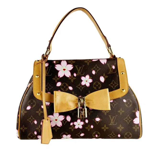 Louis Vuitton Handbag Monogram Cherry Blossom Sac Retro PM in Coated canvas from The Reluxe