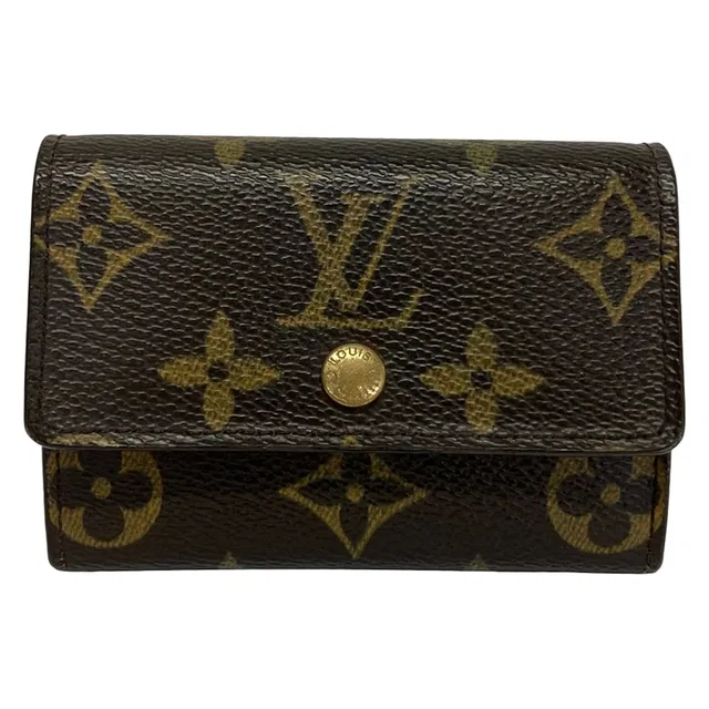 Louis Vuitton Coin Purse Monogram Portefeuille Monnaie in Coated canvas from The Reluxe