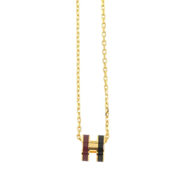 Hermès Mini Pop H Rocabar Necklace Gold Black Bordeaux in Black from The Reluxe