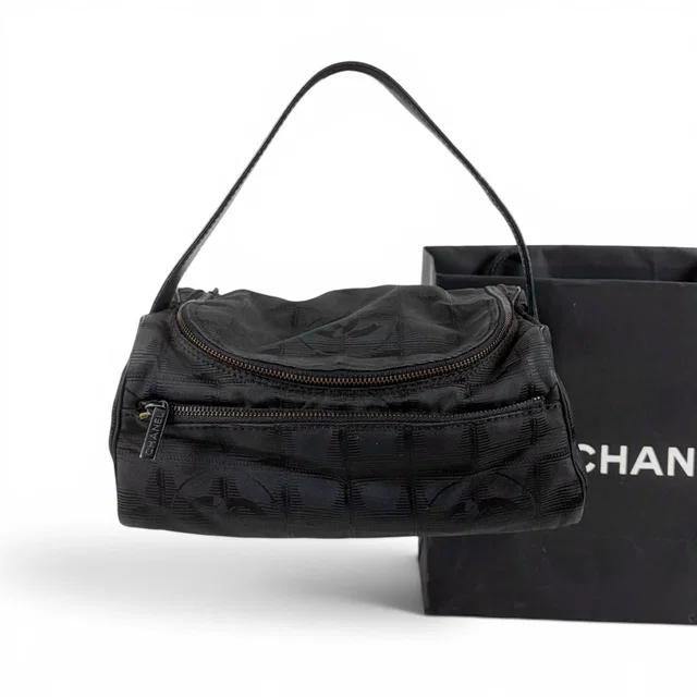 Chanel New Travel Line Vanity Pouch Black Nylon Canvas in Black Canvas from The Reluxe